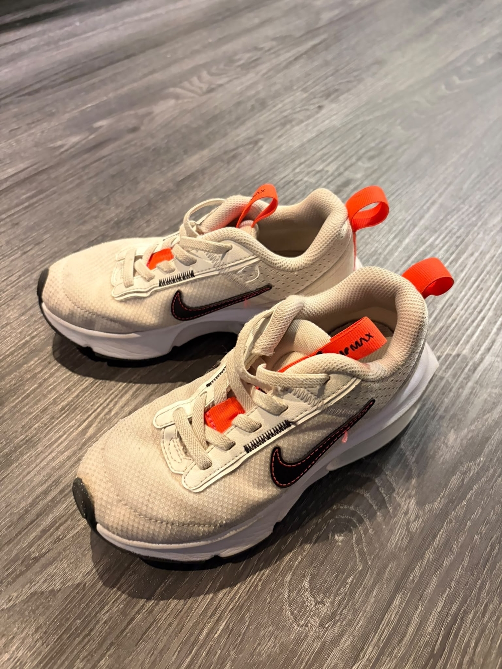 Nike Kids Beige Sneakers with Bright Orange Accents